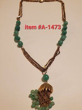 1 Triple Gold Chain Necklace, item # A-1473, 64 grams.